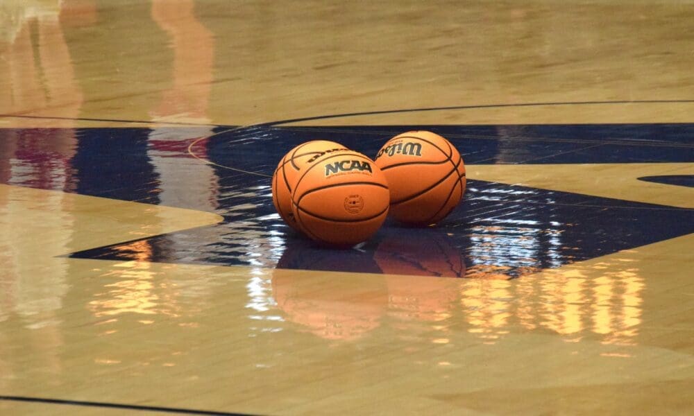 Balls on WVU basketball court stock
