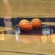 Balls on WVU basketball court stock