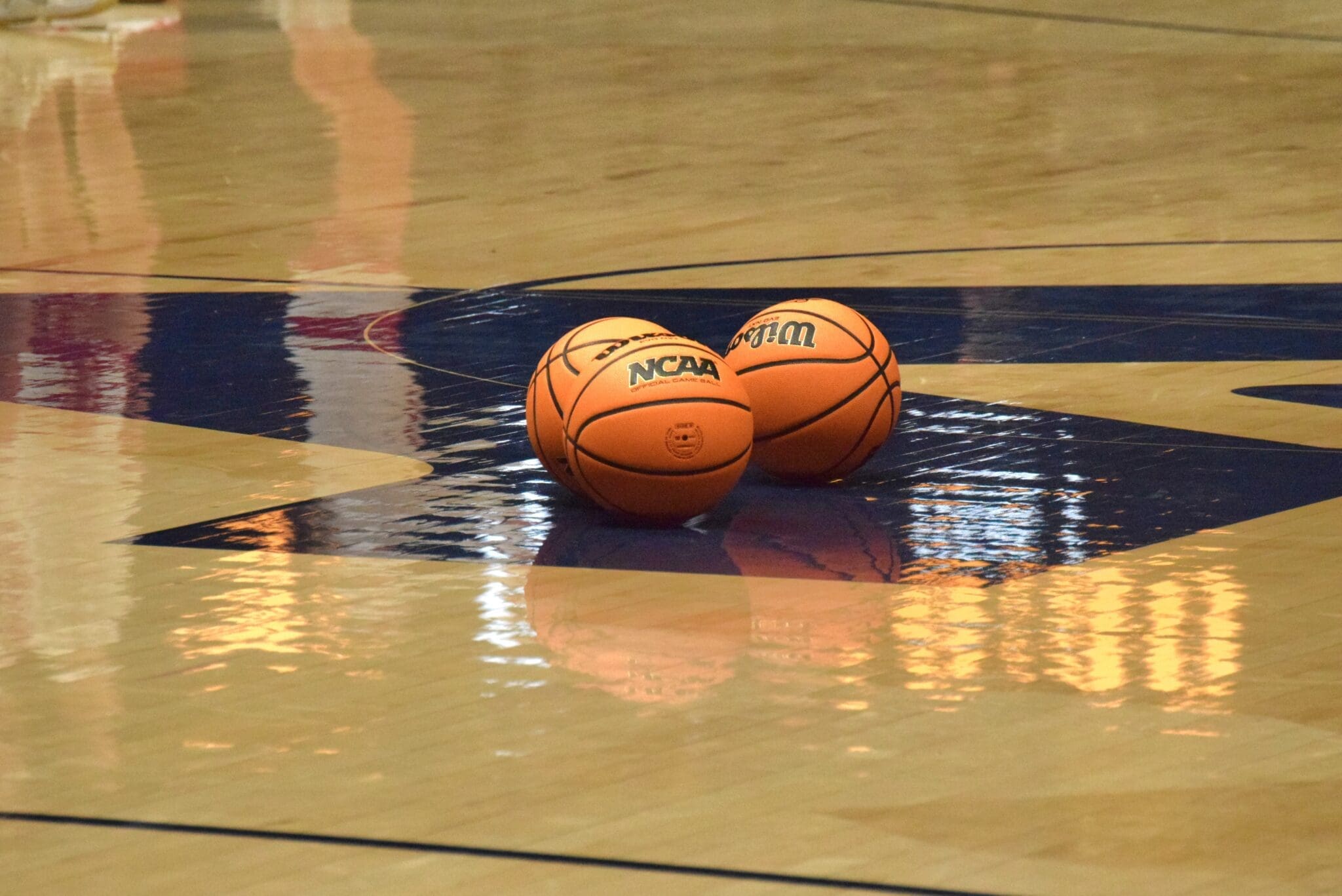 Balls on WVU basketball court stock