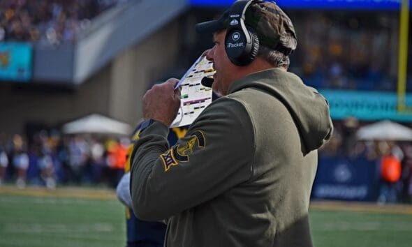 WVU Football HC Rich Rodriguez calling plays