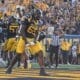 WVU Football OL Malik Agbo celebrates touchdown against Pitt