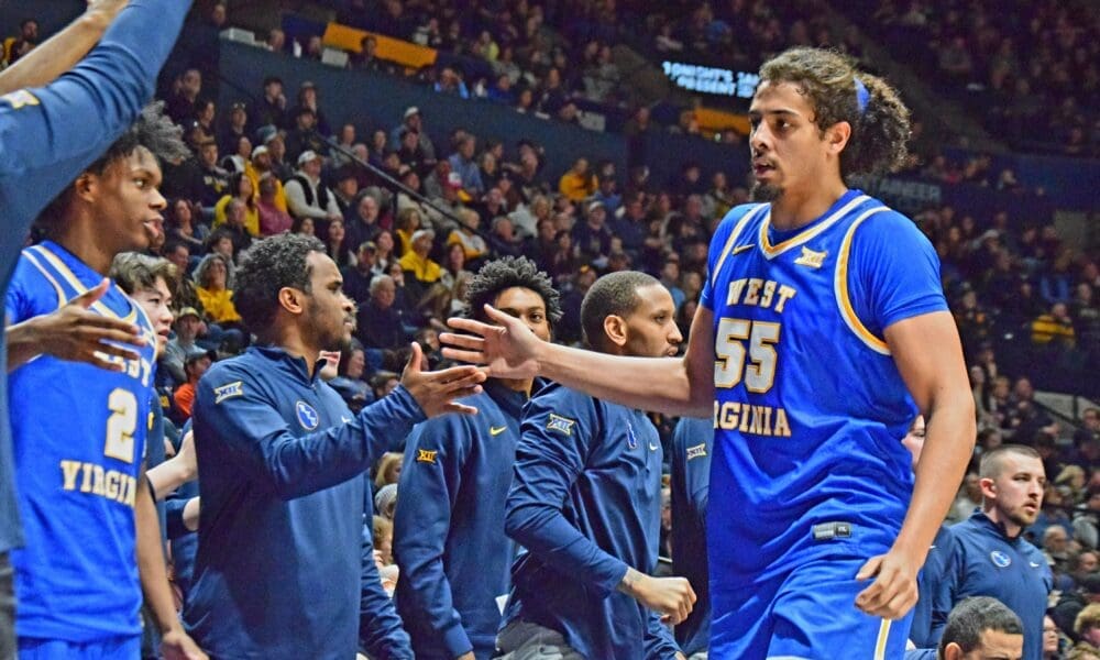 WVU Basketball Harlan Obioha and bench