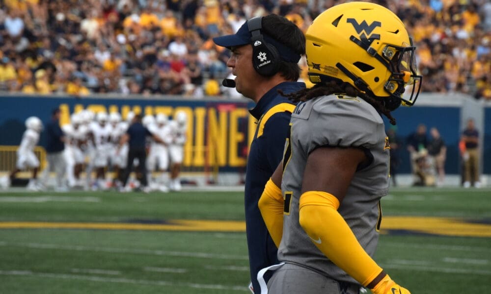 WVU Football HC Neal Brown and Aubrey Burks