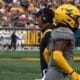 WVU Football HC Neal Brown and Aubrey Burks