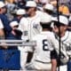 WVU Baseball players in dugout