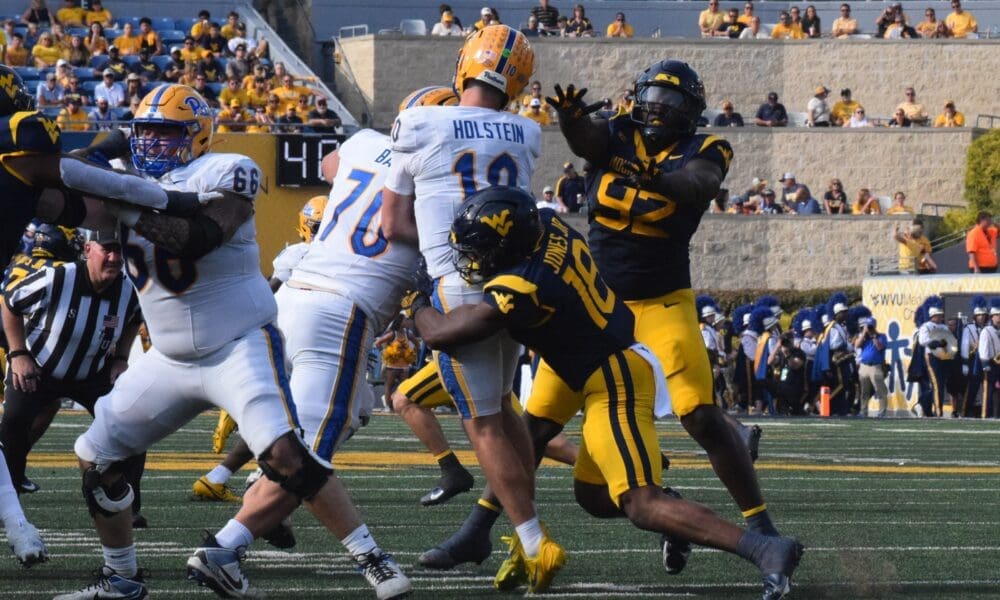 WVU Football Curtis Jones Jr. sacking Pitt quarterback Eli Holstein
