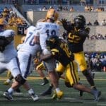 WVU Football Curtis Jones Jr. sacking Pitt quarterback Eli Holstein