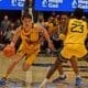 WVU Basketball Treysen Eaglestaff driving with ball against Pitt in Backyard Brawl