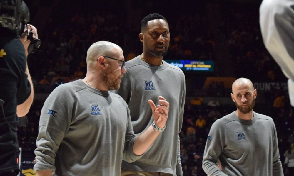 WVU Basketball director of recruiting Jay Kuntz and assistant coaches DerMarr Johnson and Alex Ruff
