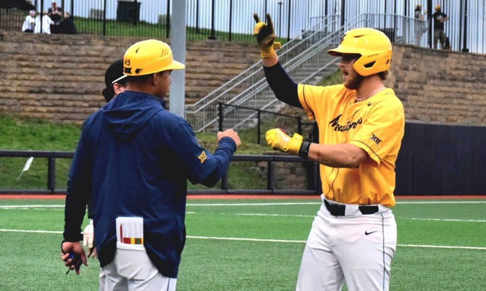 WVU Baseball Grant Hussey celebrating