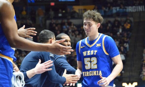 WVU Basketball Treysen Eaglestaff and bench