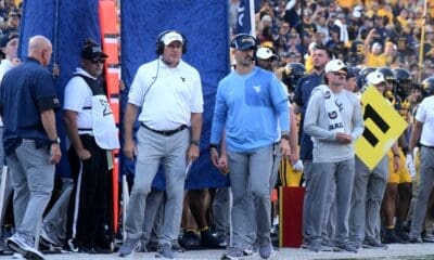 WVU Football Rich Rodriguez and Zac Alley on sideline