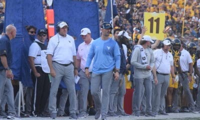 WVU Football Rich Rodriguez and Zac Alley on sideline