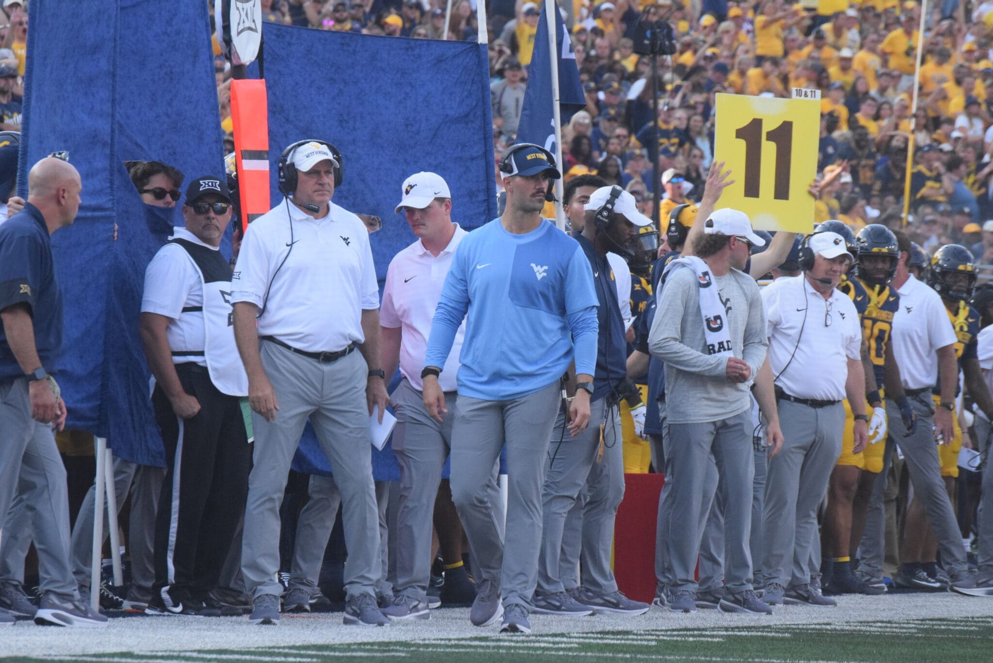 WVU Football Rich Rodriguez and Zac Alley on sideline