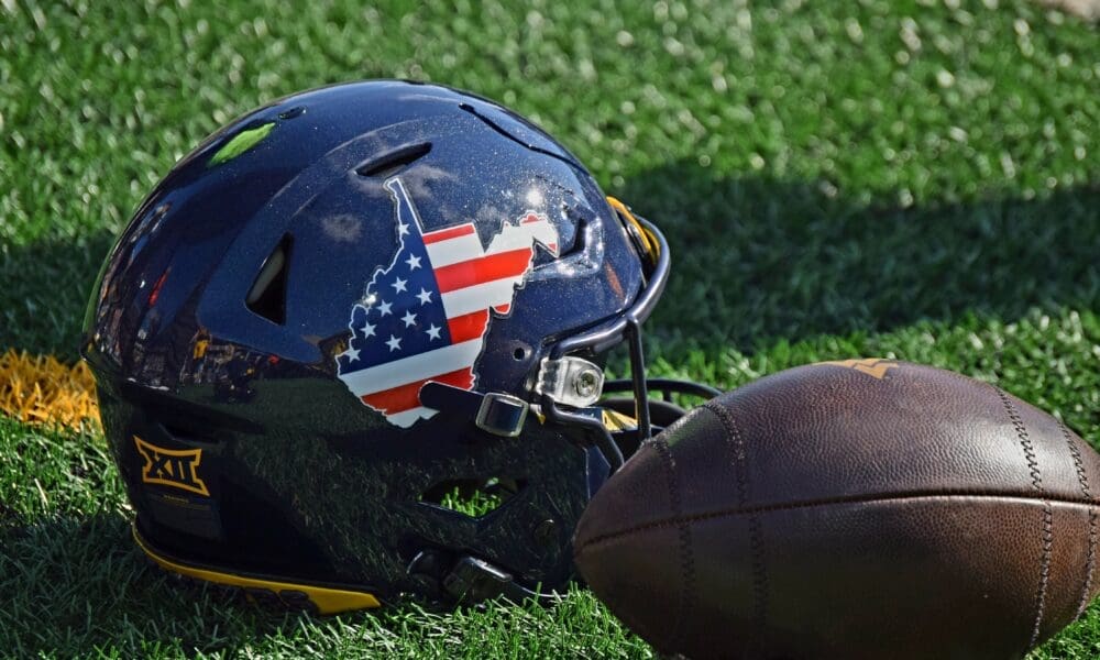 WVU Football US Flag Helmet stock
