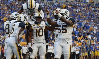 WVU defense celebrates at Pitt