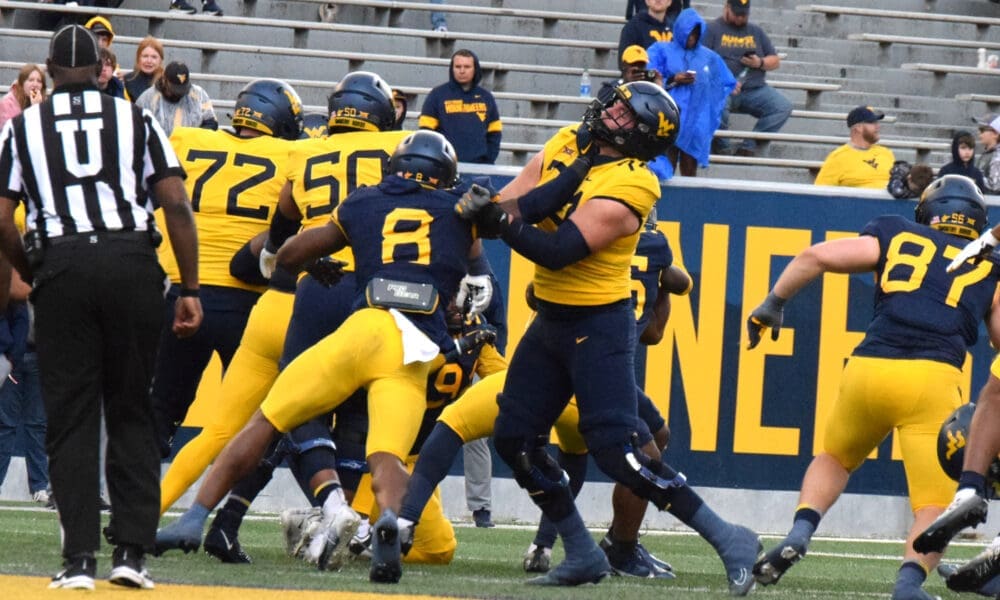 WVU Football LB Lee Kpogba and Wyatt Milum