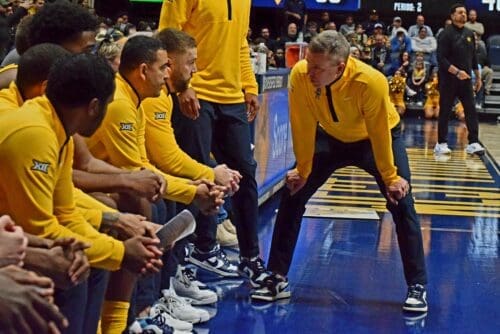 WVU Basketball HC Ross Hodge in huddle