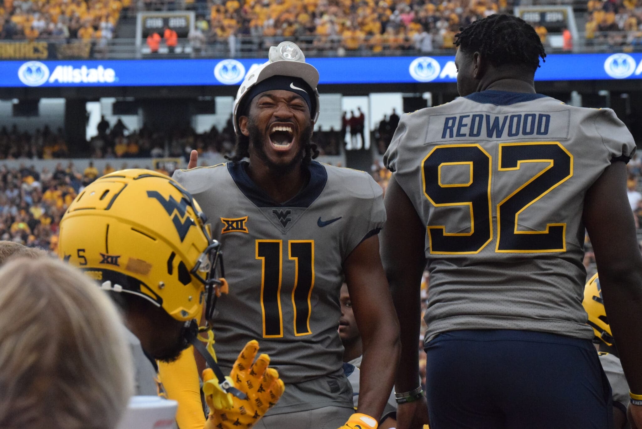 WVU Football Beanie Bishop celebrating an interception