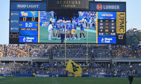 WVU Football flag at Acrisure Stadium during Backyard Brawl against Pitt