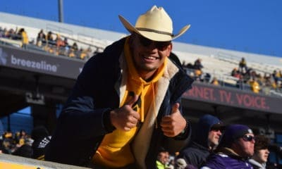 WVU fan with cowboy hat