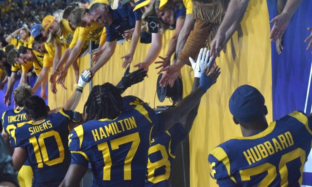 WVU Football players and fans after beating Pitt in Backyard Brawl