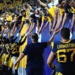 WVU Football players and fans after beating Pitt in Backyard Brawl