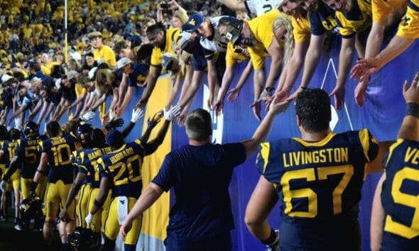 WVU Football players and fans after beating Pitt in Backyard Brawl