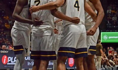 WVU Basketball Team Huddle