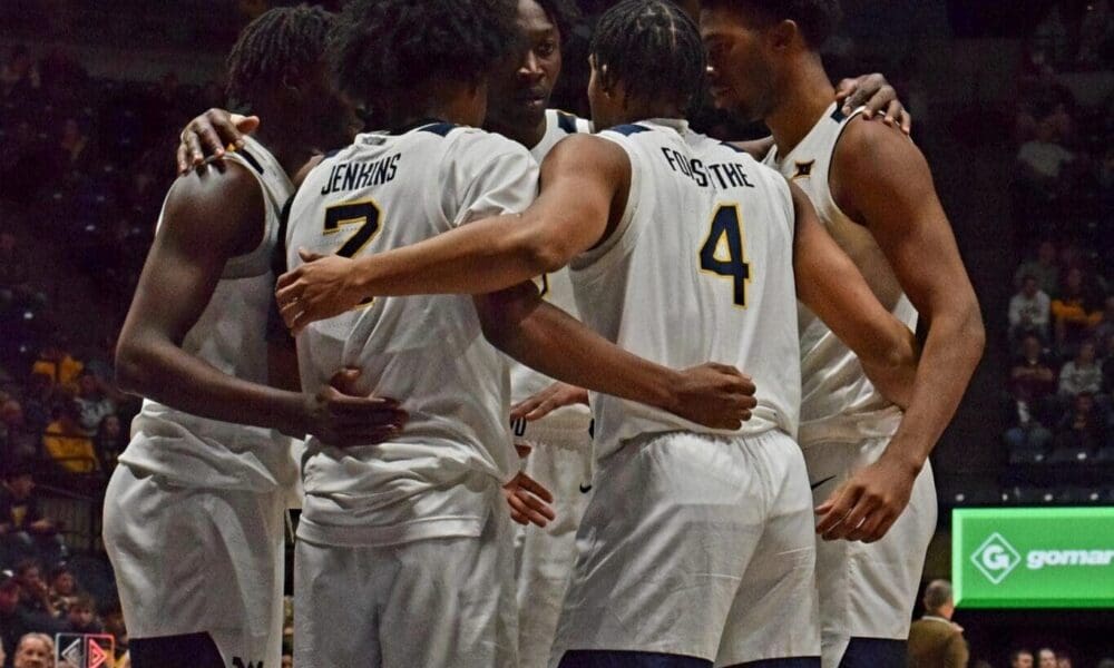 WVU Basketball Team Huddle