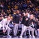 WVU Basketball Darian DeVries, Chester Frazier and Tucker DeVries celebrating