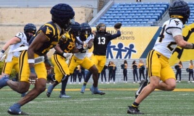 WVU Football Jaylen Henderson throwing to Rodney Gallagher