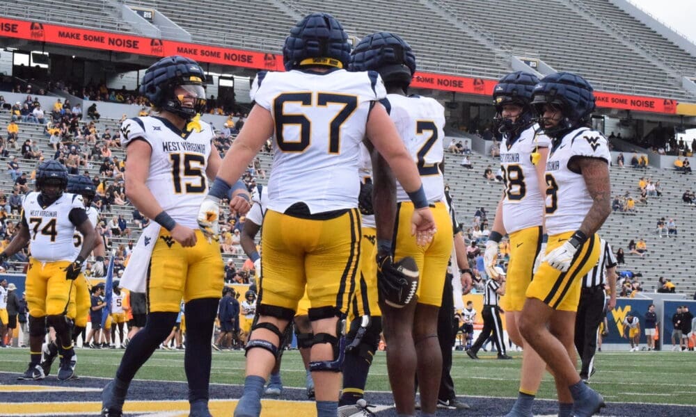 WVU Football offense with OL Landen Livingston