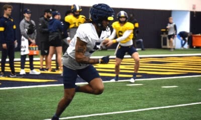 Devin Carter and Garrett Greene at WVU football practice.
