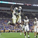 WVU defense celebrates at Pitt in Backyard Brawl