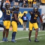 WVU Football safety Aubrey Burks calling signals to Anthony Wilson and secondary against Oklahoma State