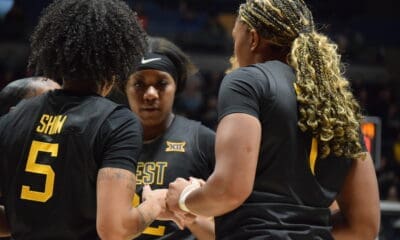 WVU Women's Basketball huddle