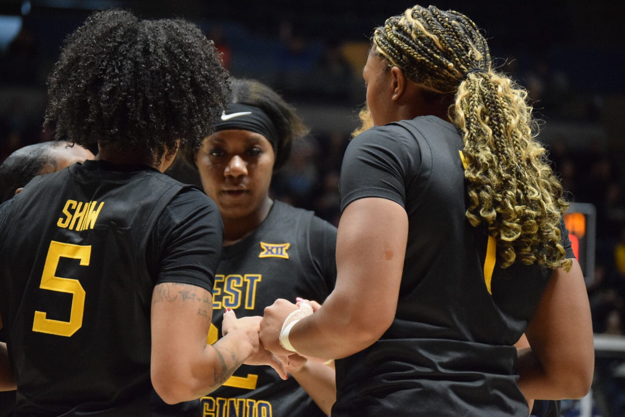 WVU Women's Basketball huddle