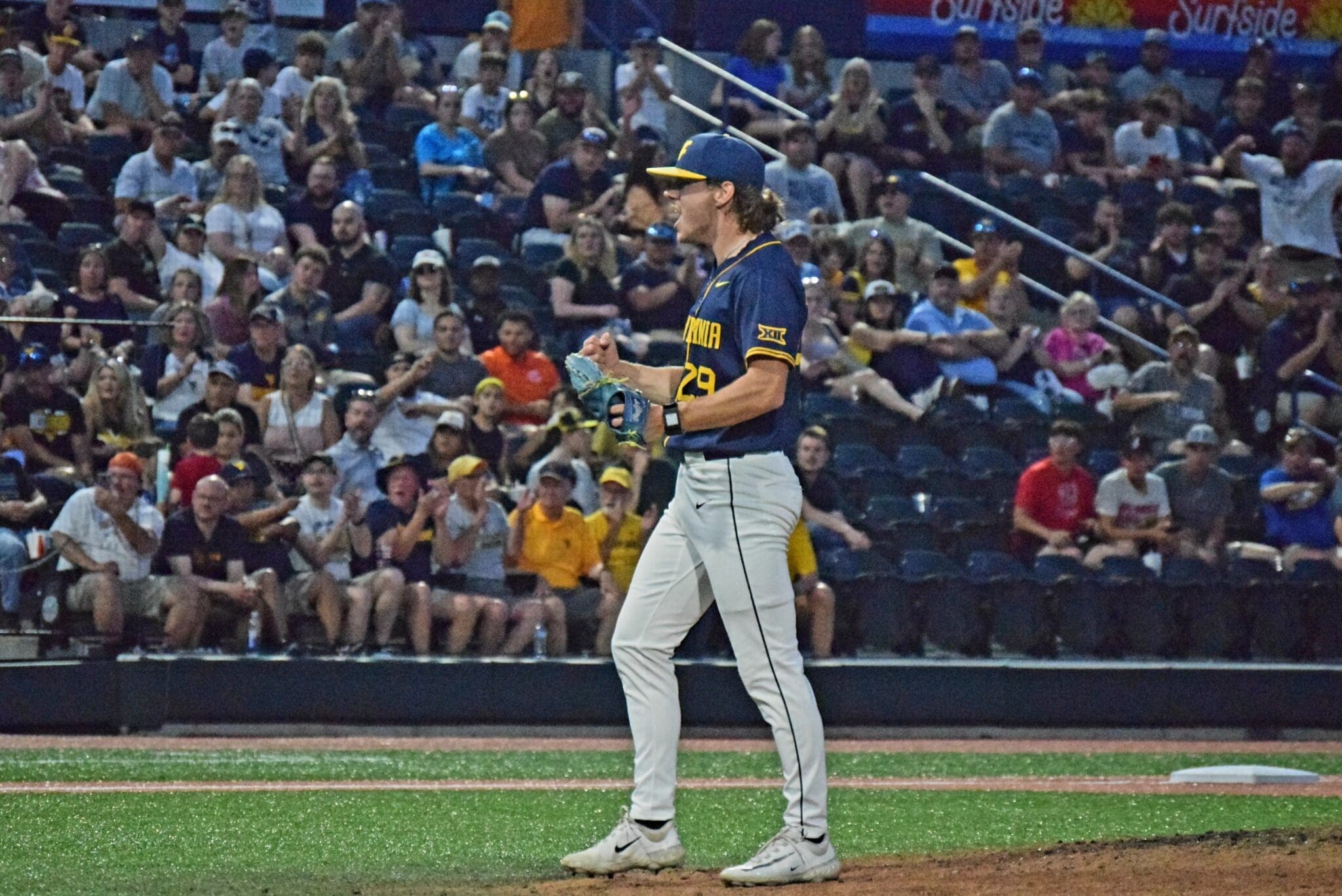 WVU Baseball Pitcher Reese Bassinger Celebrates
