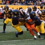 WVU Football Tyrin Bradley and Lee Kpogba tackle Oklahoma State RB Ollie Gordon