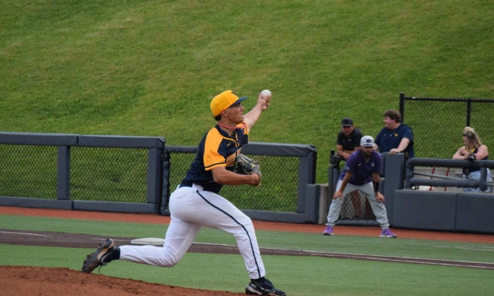 WVU baseball starter Ben Hampton pitches in a game against Kansas State in 2022.