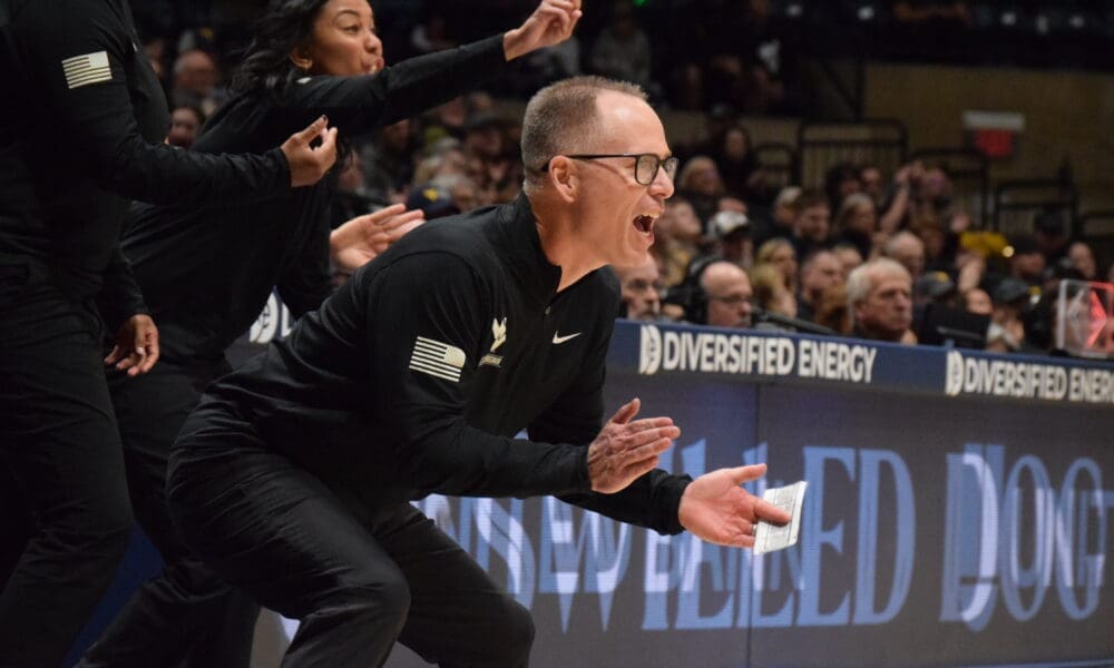 WVU Women's Basketball HC Mark Kellogg clapping