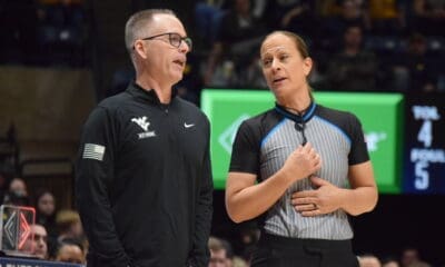 WVU Women's Basketball HC Mark Kellogg with ref