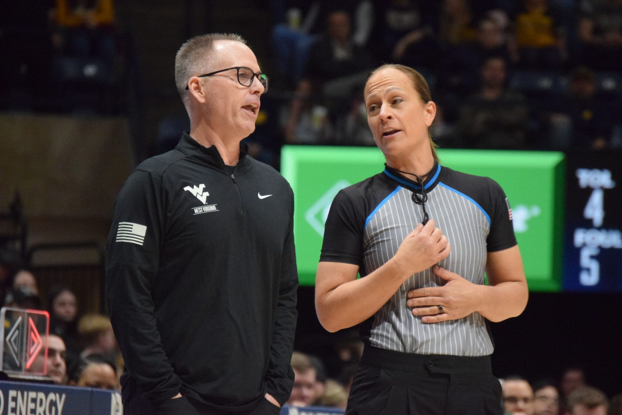 WVU Women's Basketball HC Mark Kellogg with ref