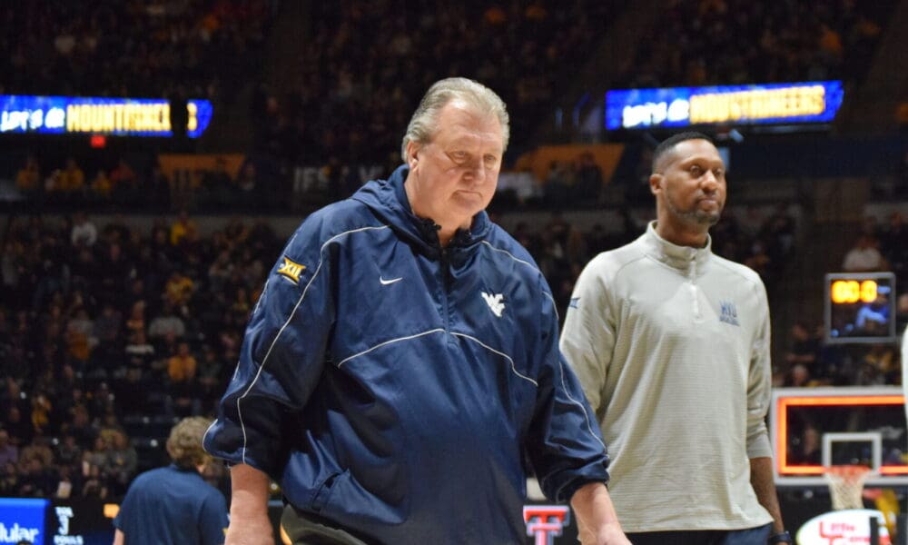 Bob Huggins and DerMarr Johnson