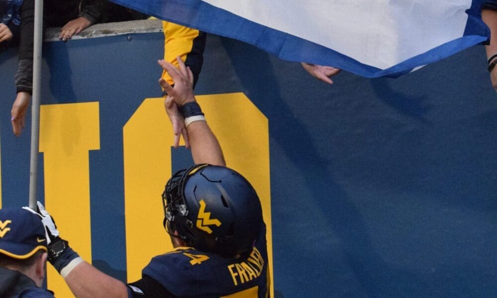 Zach Frazier with flag