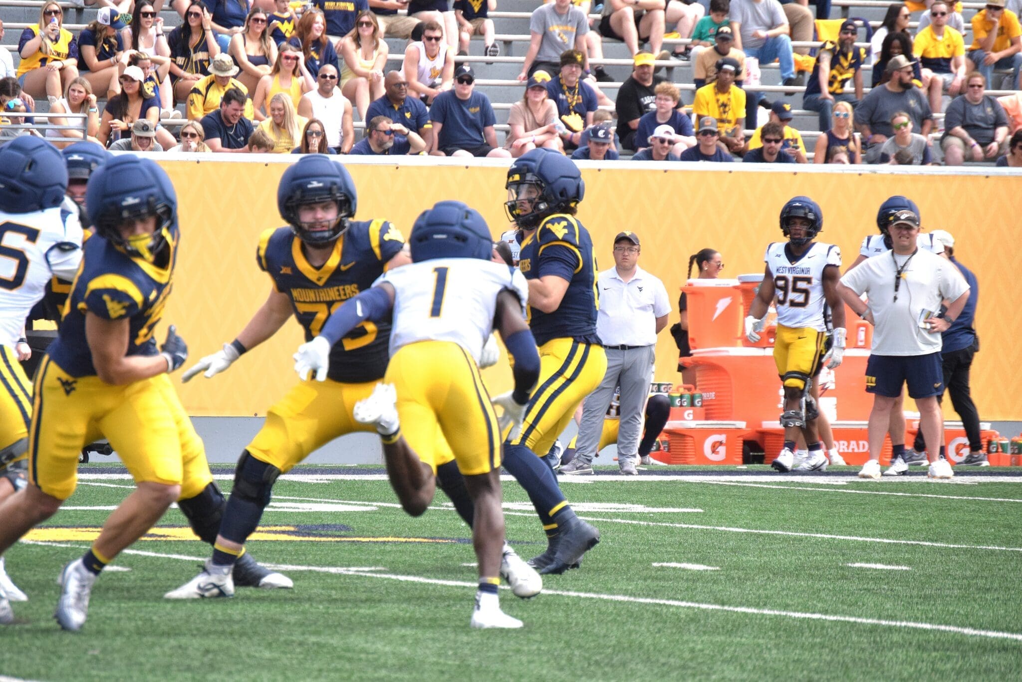 WVU Football DB Geimere Latimer rushing during scrimmage