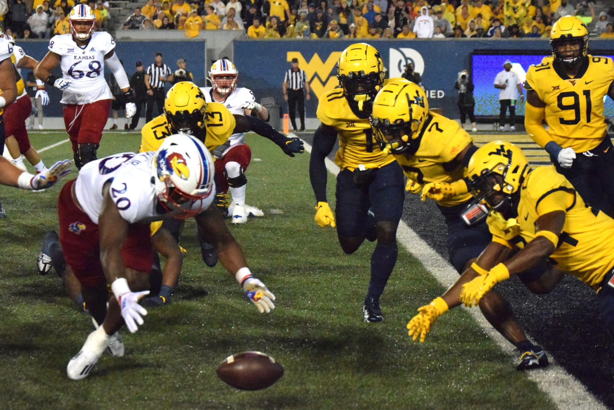 WVU Football defense goes after fumble against Kansas
