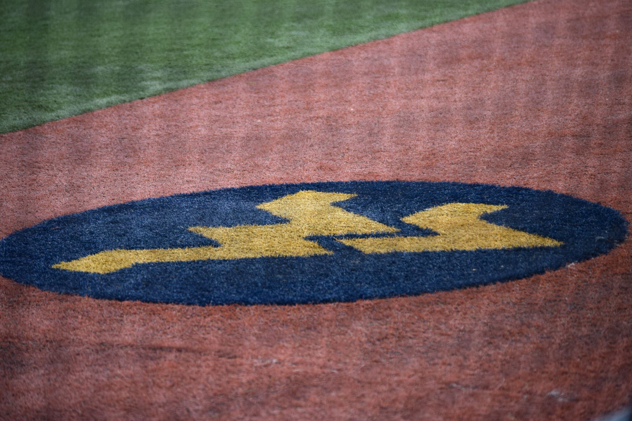 WVU baseball logo on field stock