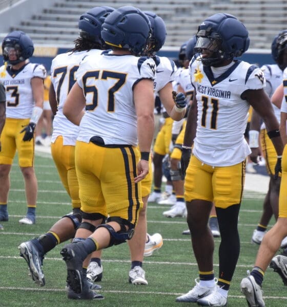 WVU Football players, including TaRon Francis at scrimmage